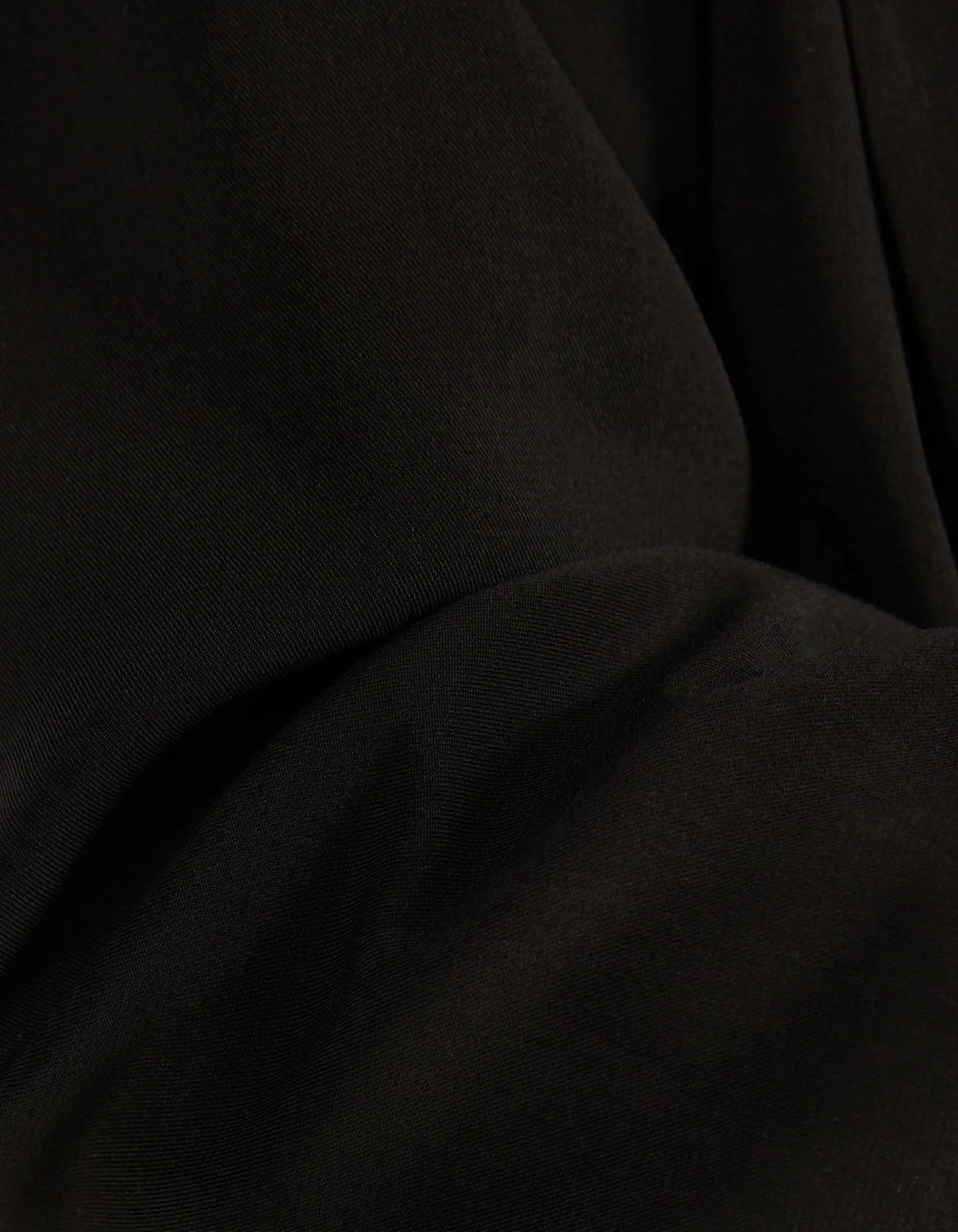 Blazer mit hochgerollten Ärmeln